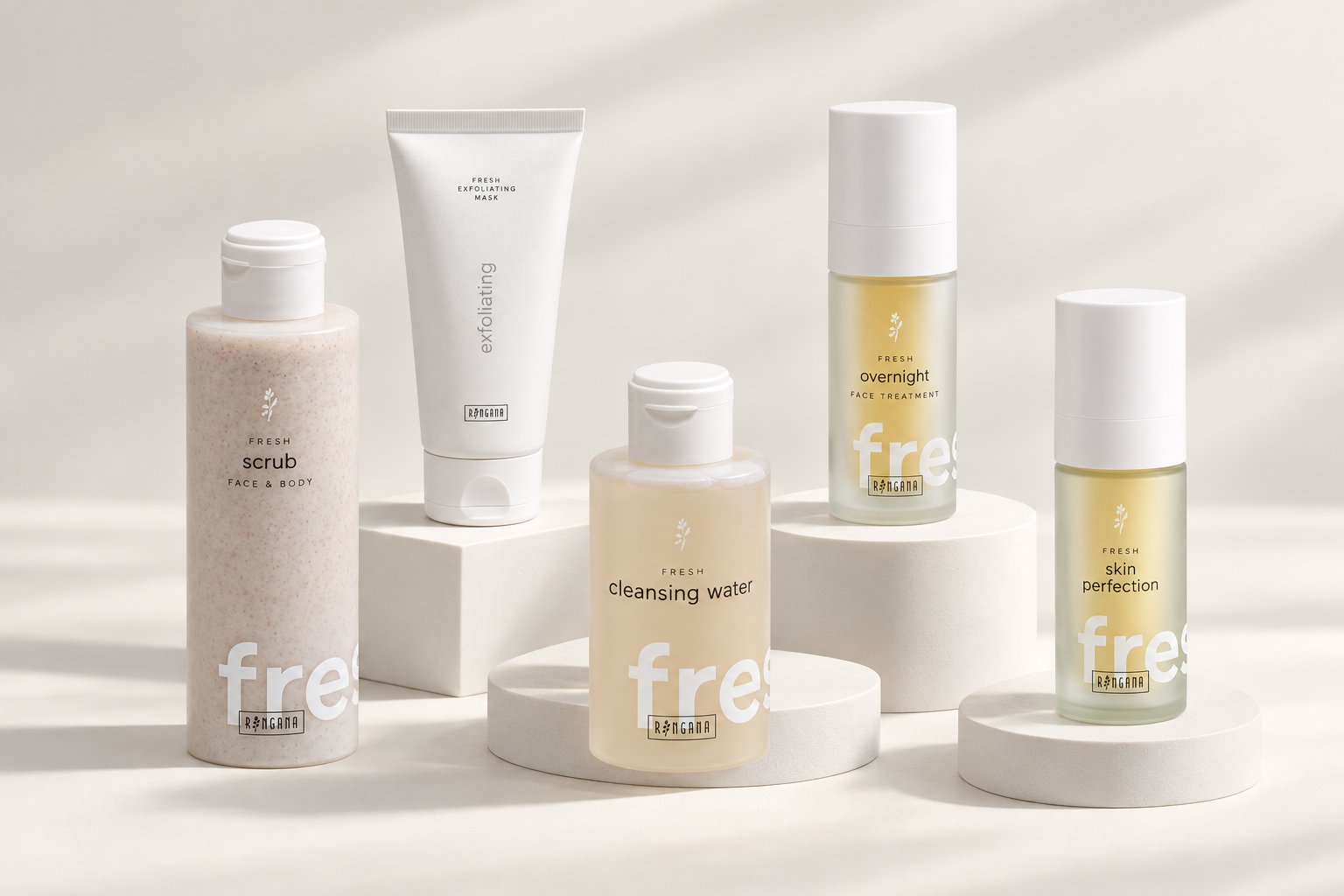 Ringana fresh product line — scrub, exfoliating mask, cleansing water and face treatments in natural light
